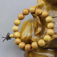 Wrist Mala Golden Sandalwood with nylon elastic cord Round & Buddhist jewelry Sold By Lot