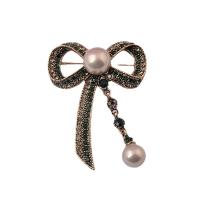 Plastic Pearl Brooch Zinc Alloy with Plastic Pearl Bowknot gold color plated for woman & with rhinestone & hollow Sold By PC