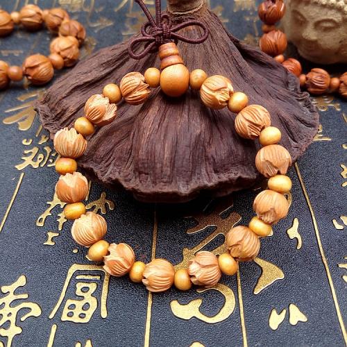 Wrist Mala, Peach Wood, Flower, Carved, fashion jewelry & Unisex & different size for choice, earth yellow, Length:Approx 18 cm, Sold By PC