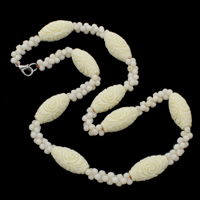 Coral Necklace Natural Coral brass lobster clasp Oval Carved two tone  Sold Per Approx 19.5 Inch Strand