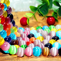 Cats Eye Jewelry Beads Round multi-colored Sold By Lot