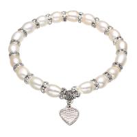 Freshwater Cultured Pearl Bracelet, Freshwater Pearl, with rhinestone brass spacer & Tibetan Style, Rice, plated, for woman, white, 7-10mm, Sold Per Approx 6 Inch Strand