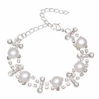Bracelet en perles de culture d'eau douce, perle d'eau douce cultivée, avec alliage de zinc, Placage de couleur argentée, pour femme & avec strass, blanc, 10x14x9mm, Vendu par Environ 7.5 pouce brin