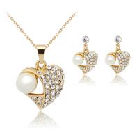 Set di gioielli di strass, orecchino & Collana, lega in zinco, with strass, 2 pezzi & gioielli di moda, dorato, Venduto da set