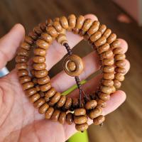Seks Disc Wood Buddhistiske perler armbånd, sienna, 5x10mm, Solgt af Strand