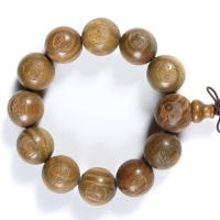 grüne Sandelholz Buddhistische Perlen Armband, geschnitzt, Sienaerde gelb, 20mm, 12PCs/Strang, verkauft von Strang