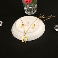 Partículas de acero Conjunto de joya, Pendiente de stud & collar, con cadena de latón, Pingüino, para mujer, dorado, longitud:45 cm, Vendido por Set