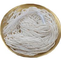 Muschelkern Perle, DIY, weiß, 2-2.5mm, verkauft per 40 cm Strang