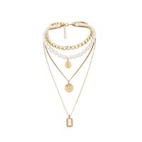 Multi Layer Necklace Zinc Alloy with Crystal & Plastic Pearl with 2.76Inch extender chain multilayer & for woman & faceted golden nickel lead & cadmium free Length Approx 12.6 Inch Approx 13.8 Inch Approx 22 Inch Approx 28.35 Inch Sold By PC