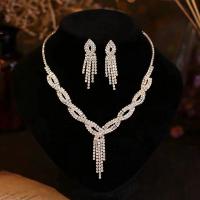 Rhinestone Jewelry Sets, earring & necklace, with Brass, with 3.1-3.9inch extender chain, silver color plated, 2 pieces & for woman & with rhinestone, 13x60mm, Length:Approx 17.7-19.6 Inch, Sold By Set