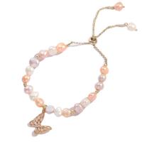 Freshwater Cultured Pearl Bracelet Freshwater Pearl with Brass Butterfly 14K gold plated Adjustable & fashion jewelry & micro pave cubic zirconia & for woman pink Length Approx 24 cm Sold By PC