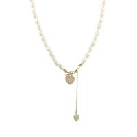 Freshwater Pearl Brass Necklace with Freshwater Pearl with 2.75inch extender chain Heart gold color plated micro pave cubic zirconia & for woman Length Approx 14.1 Inch Sold By PC