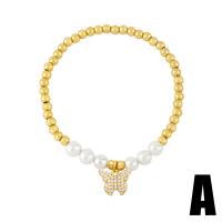 Cubic Zirconia Micro Pave Brass Bracelet with Plastic Pearl Butterfly 18K gold plated & micro pave cubic zirconia & for woman nickel lead & cadmium free Length 7.1 Inch Sold By PC