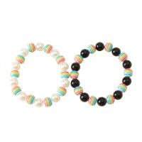 Bracelets résine, avec fil élastique & perle de plastique, 2 pièces & unisexe, plus de couleurs à choisir, Longueur:Environ 7.5 pouce, 10ensemblessérie/lot, Vendu par lot