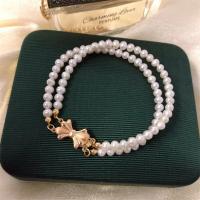 Sötvatten odlade Pearl Bracelet, Freshwater Pearl, med Mässing, Dubbla lager & mode smycken & för kvinna, vit, 4-5mm, Längd Ca 7.5 inch, Säljs av PC