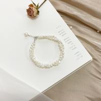 Bracelet en perles de culture d'eau douce, perle d'eau douce cultivée, avec laiton, bijoux de mode & longueur différente pour le choix & pour femme, blanc, 4-5mm, Vendu par PC