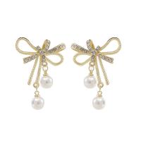 Tibetan Style Drop Earring, with Plastic Pearl, Bowknot, gold color plated, for woman & with rhinestone & hollow, 30x45mm, Sold By Pair