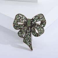 Tibetan Style Brooch, Bowknot, plated, for woman & with rhinestone & hollow, more colors for choice, 57x62mm, Sold By PC