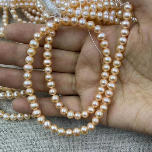 Natural Freshwater Pearl Loose Beads, Slightly Round, fashion jewelry & DIY, Orange Pink, Length about 5-6mm, Approx 70PCs/Strand, Sold By Strand