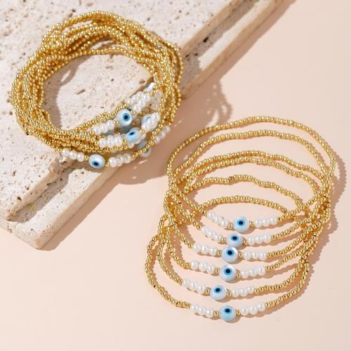 Bracelet Evil Eye bijoux, chalumeau, avec perle de plastique & laiton, Placage de couleur d'or, motif de mauvais œil & pour femme, Vendu par PC