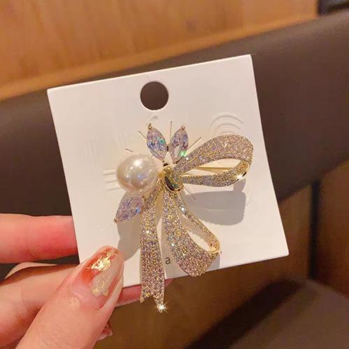 Rhinestone Brooch Zinc Alloy with Plastic Pearl Bowknot plated for woman & with rhinestone golden Sold By PC