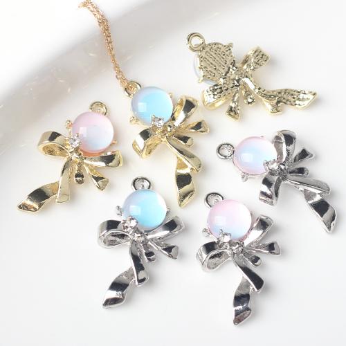 Resin Tibetan Style Pendants, with Resin, Bowknot, plated, DIY & with rhinestone, more colors for choice, nickel, lead & cadmium free, 28x17mm, 100PCs/Bag, Sold By Bag