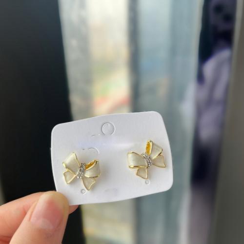 Tibetan Style Stud Earring, Bowknot, gold color plated, fashion jewelry & micro pave cubic zirconia & enamel, white, nickel, lead & cadmium free, 17x15mm, Sold By Pair