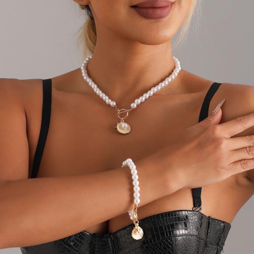 alliage de zinc Collier et bracelet, avec perle de plastique, Placage de couleur d'or, styles différents pour le choix & pour femme, Vendu par PC