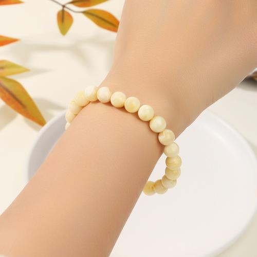 cire d'abeille bracelet, Rond, fait à la main, naturel & pour femme, blanc, beads length 6-7mm, Longueur:Environ 6 pouce, Vendu par PC