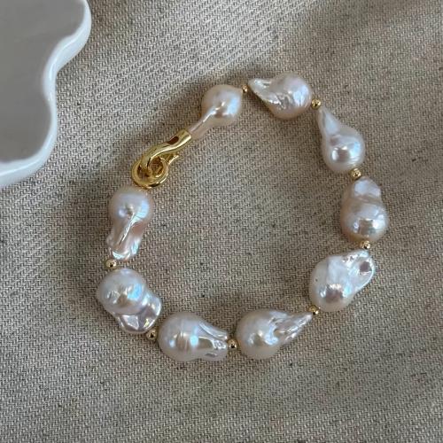 Freshwater Cultured Pearl Bracelet, Freshwater Pearl, with Brass, gold color plated, fashion jewelry, white, 11x13mm, Sold By Strand
