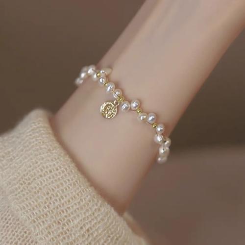 Freshwater Cultured Pearl Bracelet, Freshwater Pearl, with Brass, irregular, gold color plated, fashion jewelry, white, 4x5mm, Sold By Strand