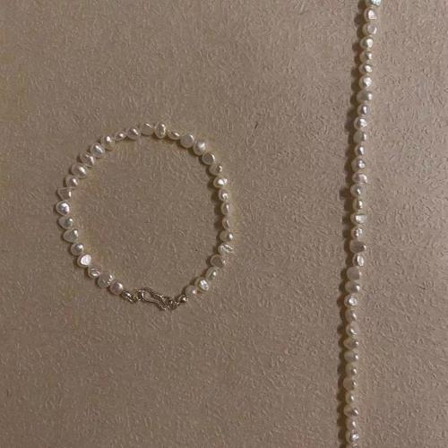 Freshwater Cultured Pearl Bracelet, Freshwater Pearl, with 925 Sterling Silver & Tiger Tail Wire, Baroque, gold color plated, fashion jewelry, white, 4x5mm, Sold By Strand