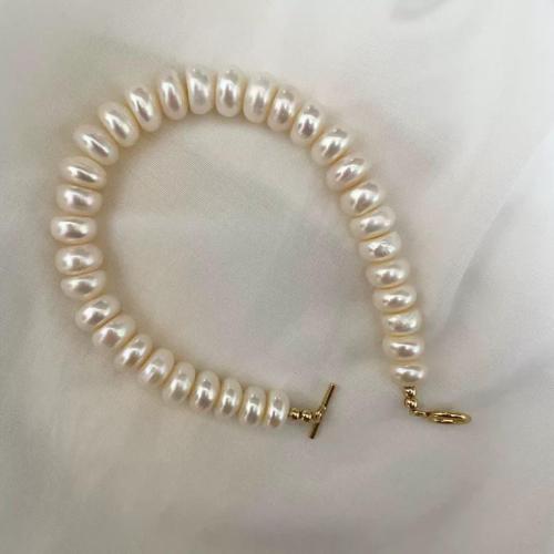 Bracelet en perles de culture d'eau douce, perle d'eau douce cultivée, avec laiton, Plat rond, Placage, bijoux de mode, plus de couleurs à choisir, 6x7mm, Vendu par brin