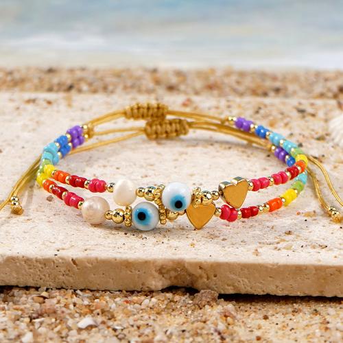 Bracelet Evil Eye bijoux, chalumeau, avec Seedbead & perle de plastique & alliage de zinc, Placage de couleur d'or, bijoux de mode, plus de couleurs à choisir, Vendu par PC