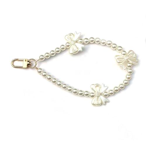 ABS Plastic Pearl Cell Phone Chain, with Crystal & Tibetan Style, Bowknot, handmade, anti-skidding & for woman, more colors for choice, Length:Approx 16.5 cm, Sold By PC