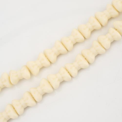 Natürliche Korallen Perlen, Schleife, DIY, gelb, 12x9x6mm, verkauft von Strang